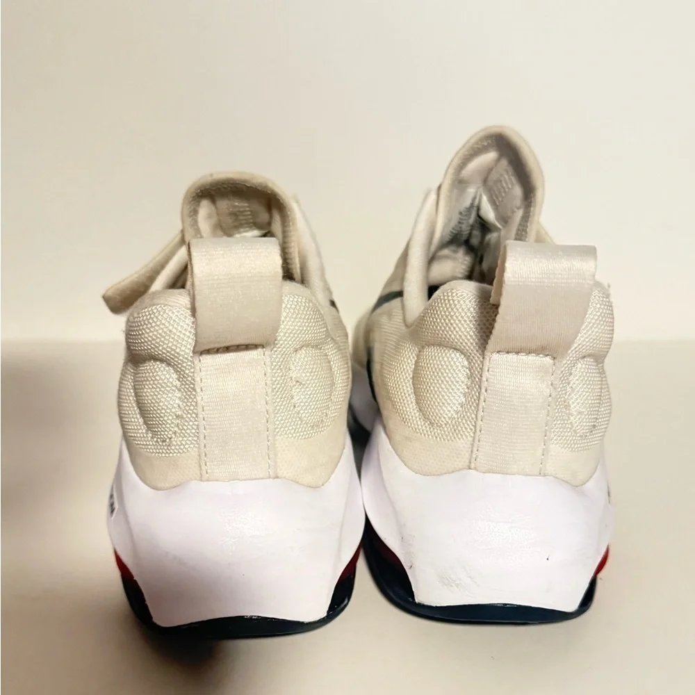 Nike Kids White and Black Sneakers with Pink Accents